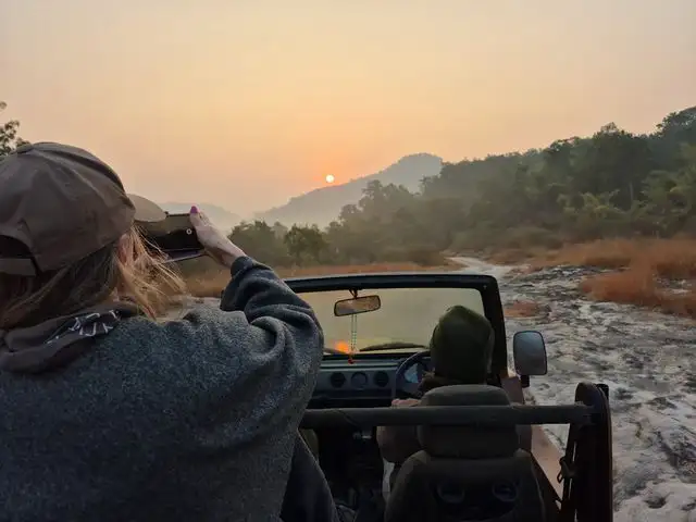 guest enjoying evening safari
